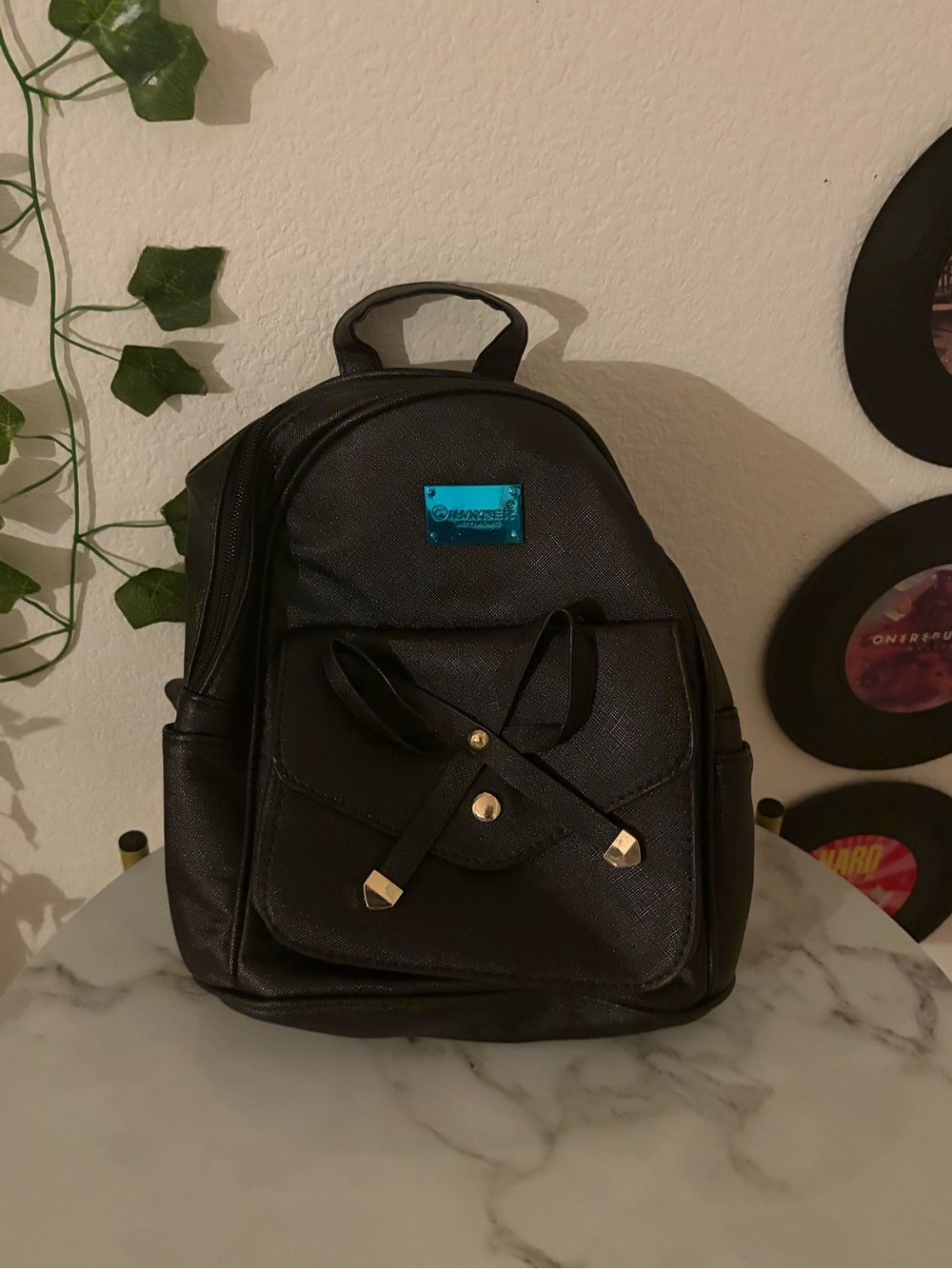 Black Mini Backpack with Gold Accents